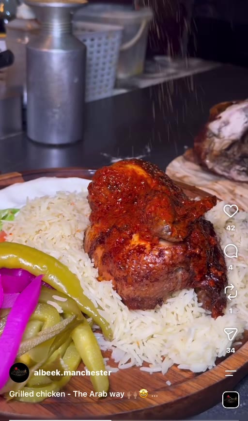 Albeek grilled chicken served with rice, pickles and fresh bread